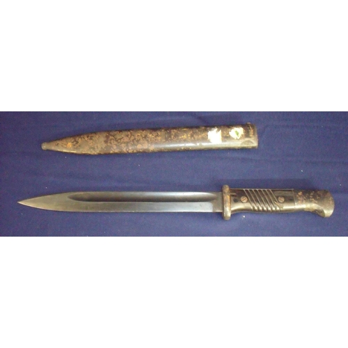 57 - German Mauser bayonet the blackened blade stamped 8079, the makers name Clemen & Jung the sheath fur... 
