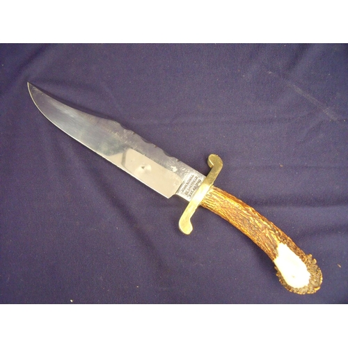 65 - John Nowill of Sheffield bowie knife with 8 inch blade, brass cross piece and antler grip