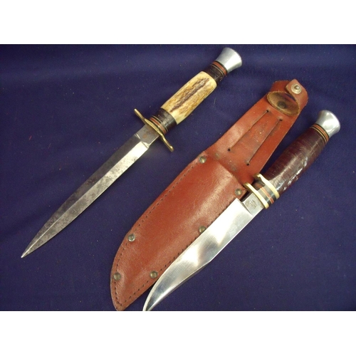 72 - Milbro barrel handled sheath knife with 5 inch blade complete with leather sheath and a double edged... 