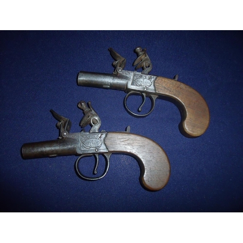 81 - Pair of flintlock pocket pistols by T Ketland and Co, London with 1.5 inch barrel stamped with vario... 