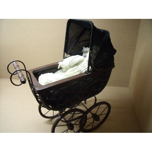 50 - Wooden constructed Victorian style coach built dolls pram with porcelain headed Alberon doll