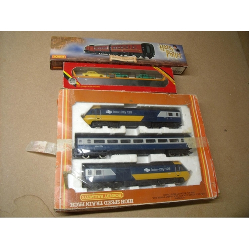 54 - Boxed Hornby OO gauge Intercity 125 set, a R126 car transporter and a Hogwarts Express coach