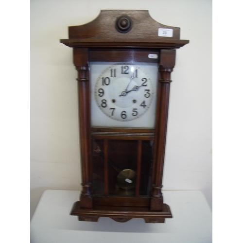 23 - Steel faced mahogany cased wall clock