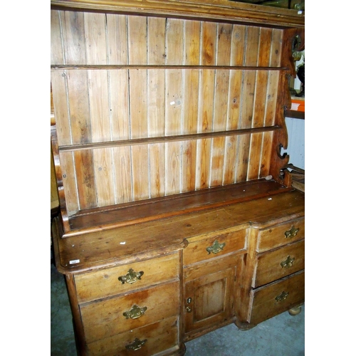 328 - Victorian waxed pine dresser with two tier raised back above central drawer and panelled cupboard fl... 
