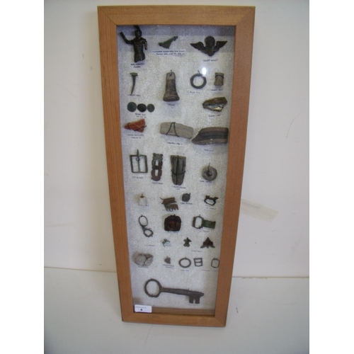 4 - Glazed framed and mounted display of various metal detector and archaeological finds including vario... 