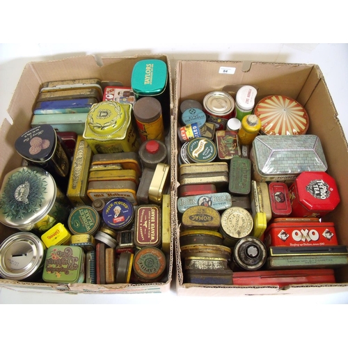 84 - Extremely large quantity of various assorted tins in two boxes including tobacco tins, home ware pro... 