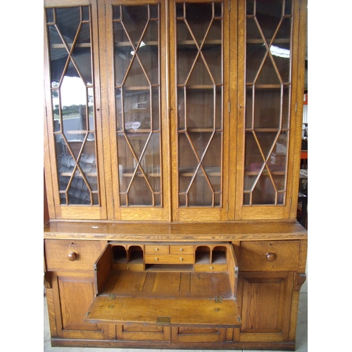 137 - Victorian oak country house style secretaire bookcase cabinet with four glazed upper cupboard doors ... 