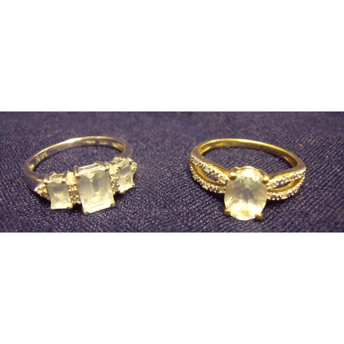 108 - Two 9ct gold dress rings, one in white gold set with three baguette shape cut stones and diamond chi... 