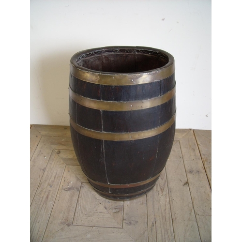 17 - Brass coopered oak barrel stick stand (61cm high)