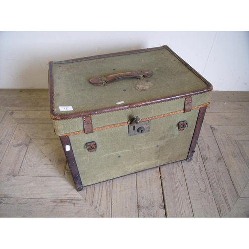 18 - Vintage canvas and leather trimmed travelling trunk with star painted detail to the side and heavy b... 