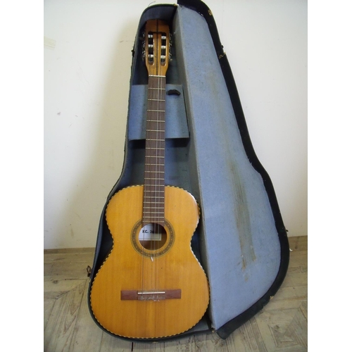 25 - Cased KC.366 acoustic guitar