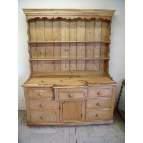 325 - Victorian waxed pine break front dresser with two tier raised back above central  cupboard door flan... 