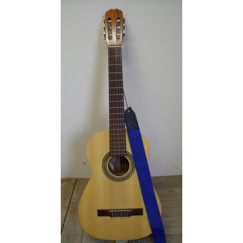 36 - Six string acoustic guitar