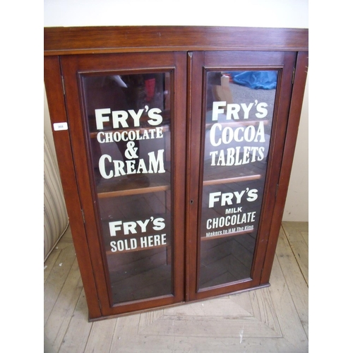 368 - Edwardian mahogany display cabinet enclosed by two glazed doors with painted 'Chocolate Advertising'... 