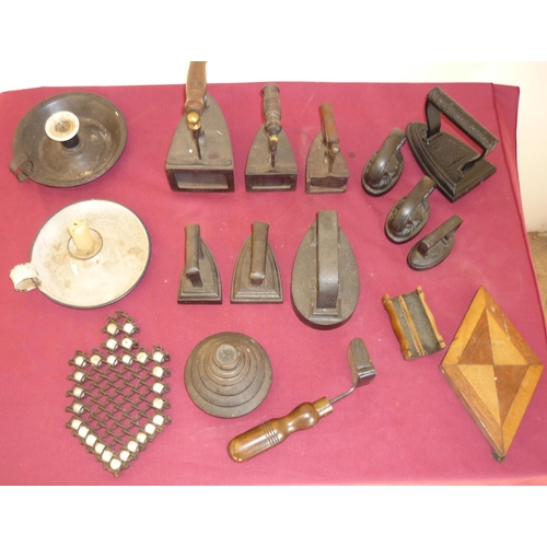 42 - Interesting collection of various assorted flat irons, wirework iron stand, two scarce oval shaped h... 