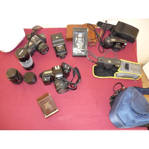 90 - Selection of cameras and camera equipment including cased Nikon F50 with Sigma Zoom 24-70mm lens, a ... 