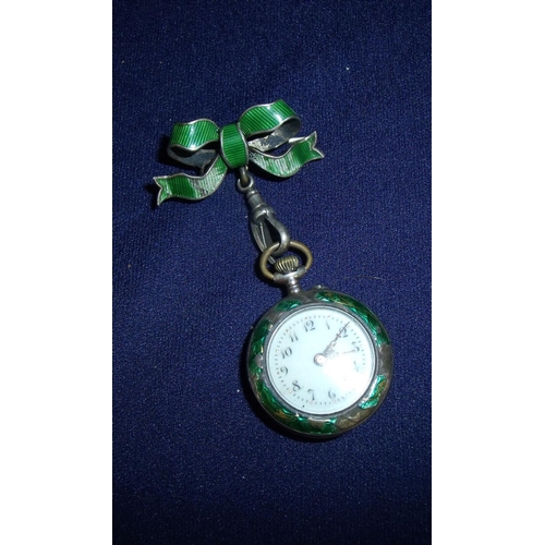 149 - Ladies silver and enamel fob watch with enamel and seed pearl bow hanging pendant with Swiss movemen... 