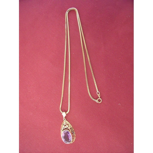 124 - 9ct gold necklace & amethyst set pendant