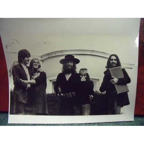 802 - 10x8inch black & white picture taken during the last photo shoot with The Beatles, the picture featu... 