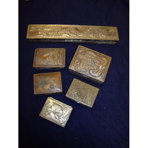 126 - Selection of Chinese/Japanese silver plated and other table boxes, all with various embossed designs... 