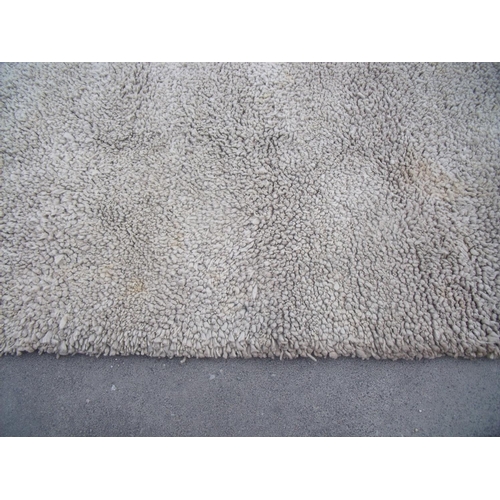 452 - Extremely large beige woollen style shaggy rug