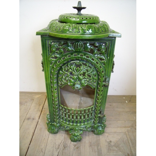 455 - Late 19th C French cast metal and green enamel stove converted into a display light (70cm high)