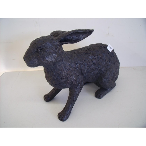 12 - Composite figure of a seated rabbit