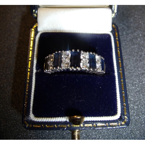 180 - 18ct gold diamond and sapphire half eternity ring set with five baguette shaped sapphires and eight ... 