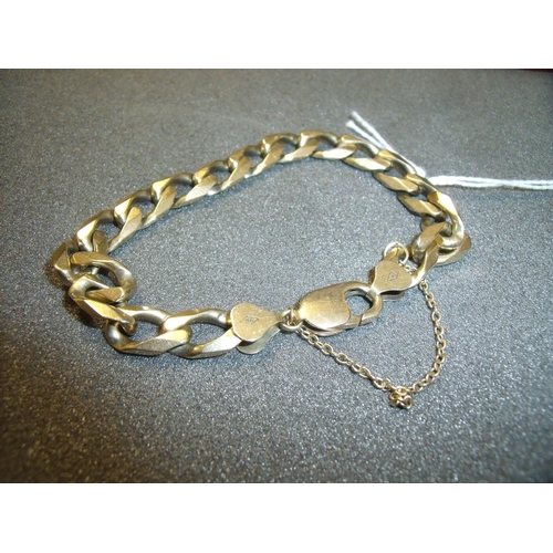 182 - 9ct gold heavy curb link bracelet with safety chain, overall length 18cm (24grams)