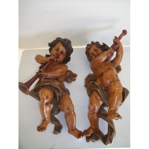 39 - Pair of painted carved musical cherubs (approx. 52cm high)