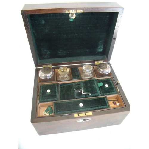 40 - Rosewood and Mother of Pearl inlaid dressing table box, the hinged lid revealing fitted interior wit... 