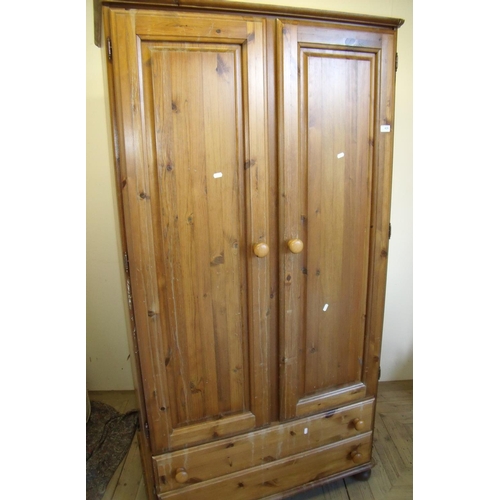 424 - Modern pine double door wardrobe with two drawers to the base (width 92cm)