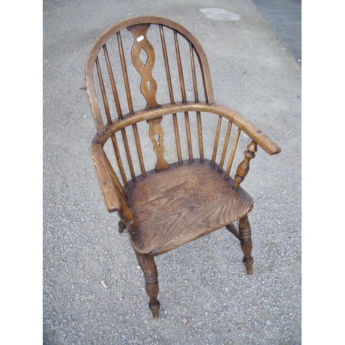 433 - 19th C elm Windsor chair with H shaped under stretcher and turned supports