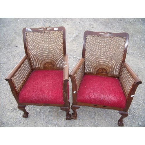 435 - Pair of early 20th C mahogany Bergere style armchairs with upholstered seats and cane work back and ... 