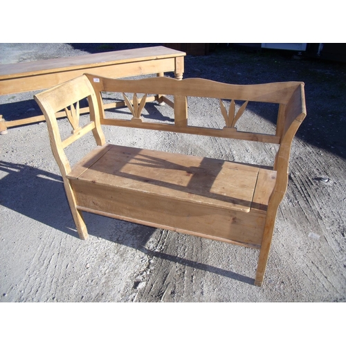 447 - Waxed pine hall bench with lift up boxed seat (width 118cm)