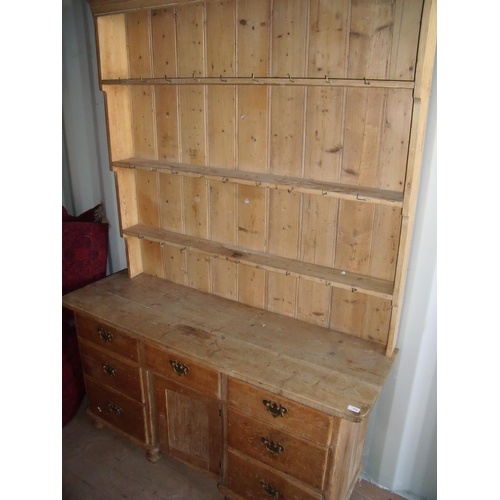 458 - Victorian waxed pine dresser with three tier raised detachable top above three drawers and central p... 