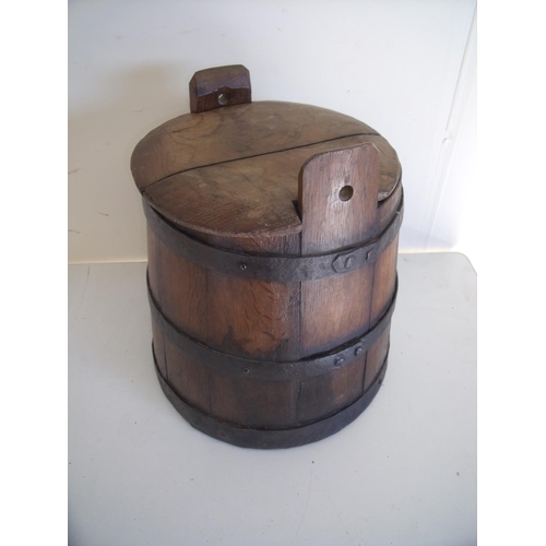 51 - Iron bound and coopered oak bucket/pail of tapering form with lift of lid (38cm high)