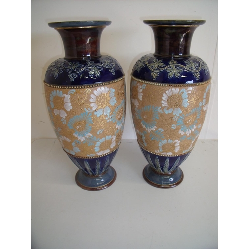 58 - Pair of Royal Doulton Stoneware vases with various stamp marks to the base (44cm high)