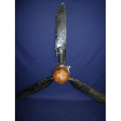 30 - Black lacquered three bladed aeroplane style propeller with multi-sectional cone block (height 76cm)