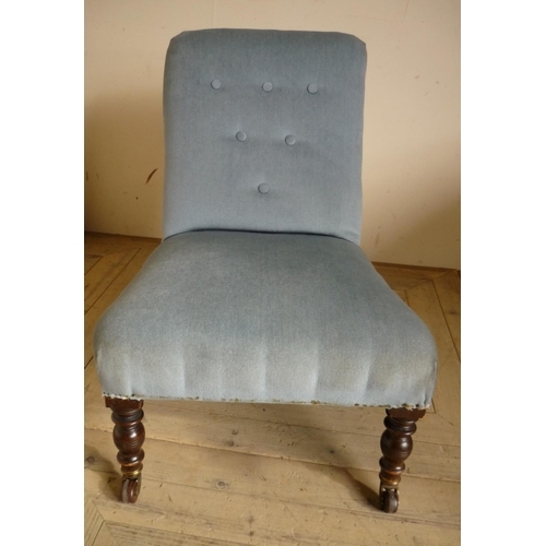 467 - Victorian upholstered low seated chair on turned mahogany supports