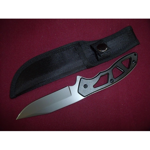 112 - Boxed as new sheath knife with 4nch blade and woven sheath