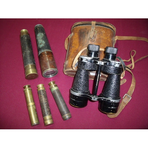16 - Brown leather cased pair of British military issue binoculars Bino Prism No5 mk 3x7 No36009, three s... 