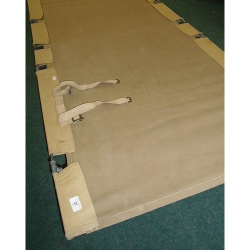 27 - Military style canvas and metal framed camp bed