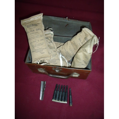 47 - Rectangular tin with a small selection of dummy rounds, various tools and WWII period Sorbsil silica... 