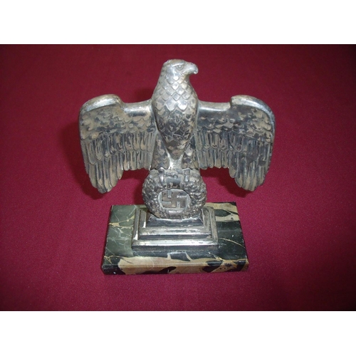 5 - German WWII Third Reich eagle above swastika desk ornament on stepped base and rectangular marble pl... 
