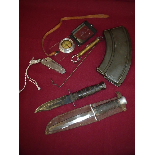 64 - Miscellaneous selection of various items including combat style knife a sheath knife a Bren gun maga... 