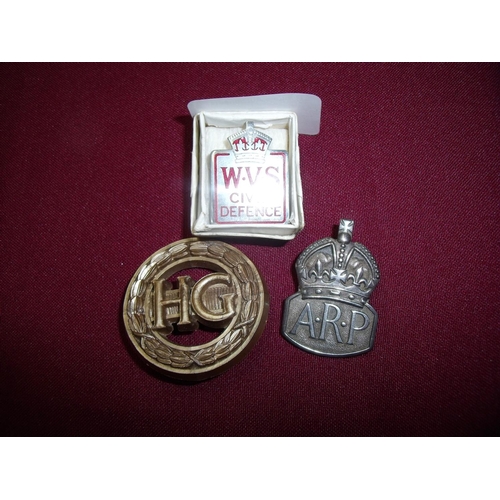 7 - Silver hallmarked ARP lapel badge a PROV.PAT HG badge by Stanley & Sons Walsall and a boxed WVS civi... 