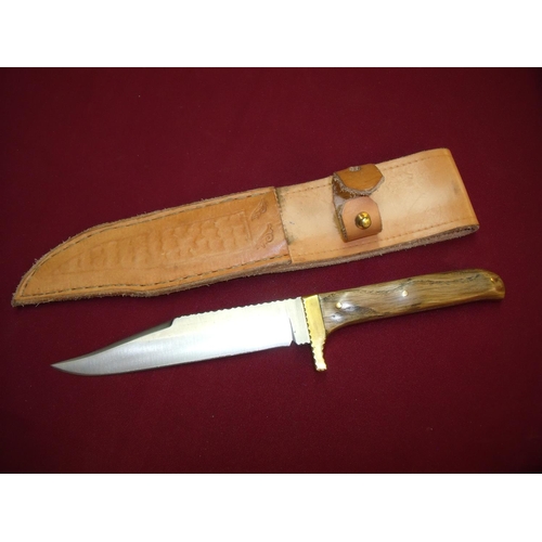 75 - Harry Boden 6 1/4 inch bladed sheath knife with two piece wooden grip and brass mounts complete with... 