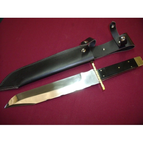 79 - Extremely large bowie knife by R Cooper Sheffield with 12 inch blade, brass mounts and horn grips co... 