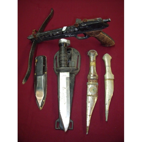 81 - Throwing knife with leather sheath, two Indo Persian style knives, divers knife and a Barnett Triden... 